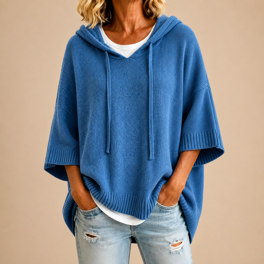 Orielle | Poncho-style knitted sweater with hood and three-quarter sleeves.