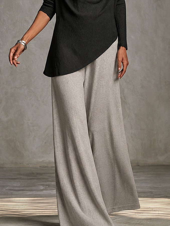 Oriah | Long sleeve top with draped neckline in black and light gray wide-leg pants in two pieces